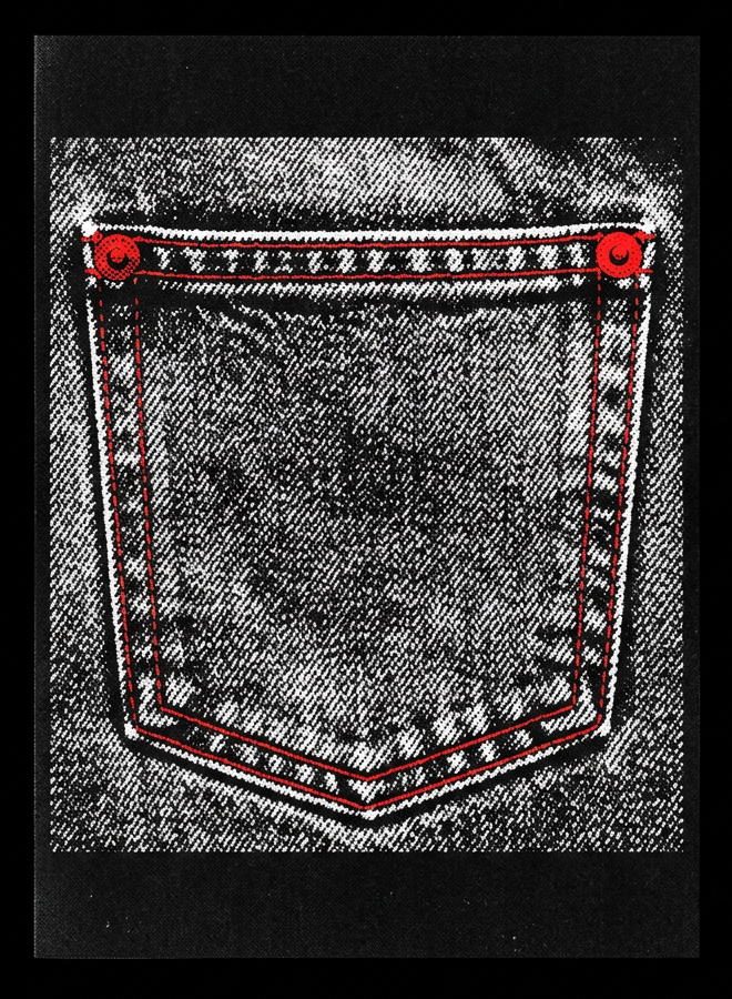 A denim back pocket with red stitching